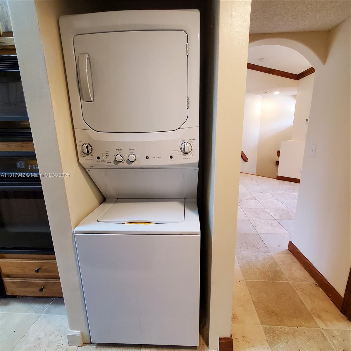 Parc Court Condominiums Plantation, FL 33324 - Photo 42 of 45 a utility room with dryer and washer