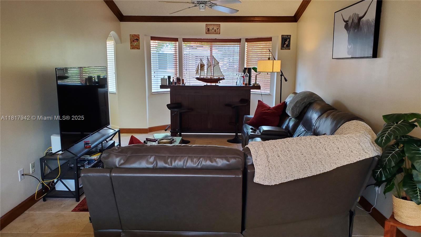 Parc Court Condominiums Plantation, FL 33324 - Photo 9 of 45 a living room with furniture and wooden floor
