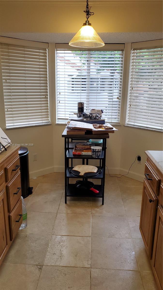 Parc Court Condominiums Plantation, FL 33324 - Photo 10 of 45 a kitchen with a sink a stove and a window