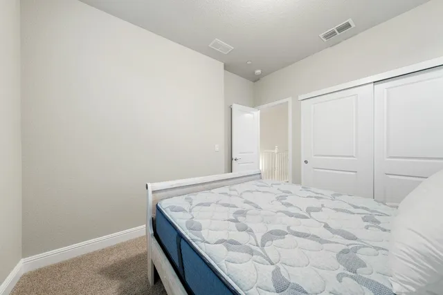 a bathroom with a sink toilet tub and shower