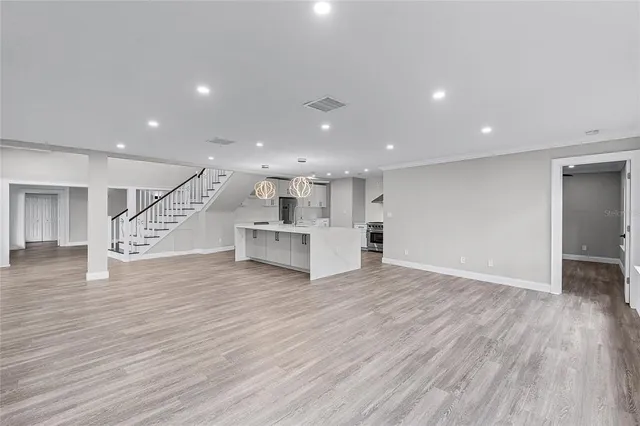 a view of kitchen with wooden floor