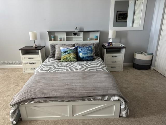 99 Southeast Mizner Boulevard, Unit 821 Boca Raton, FL 33432 - Photo 11 of 23 a bathroom with a sink and a mirror