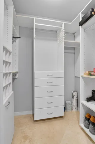 a view of an empty walk in closet