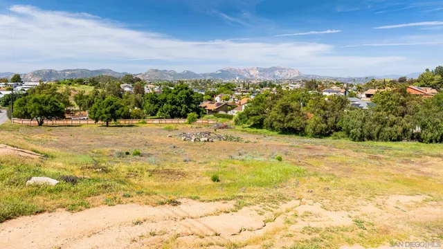 a view of a yard with an ocean view
