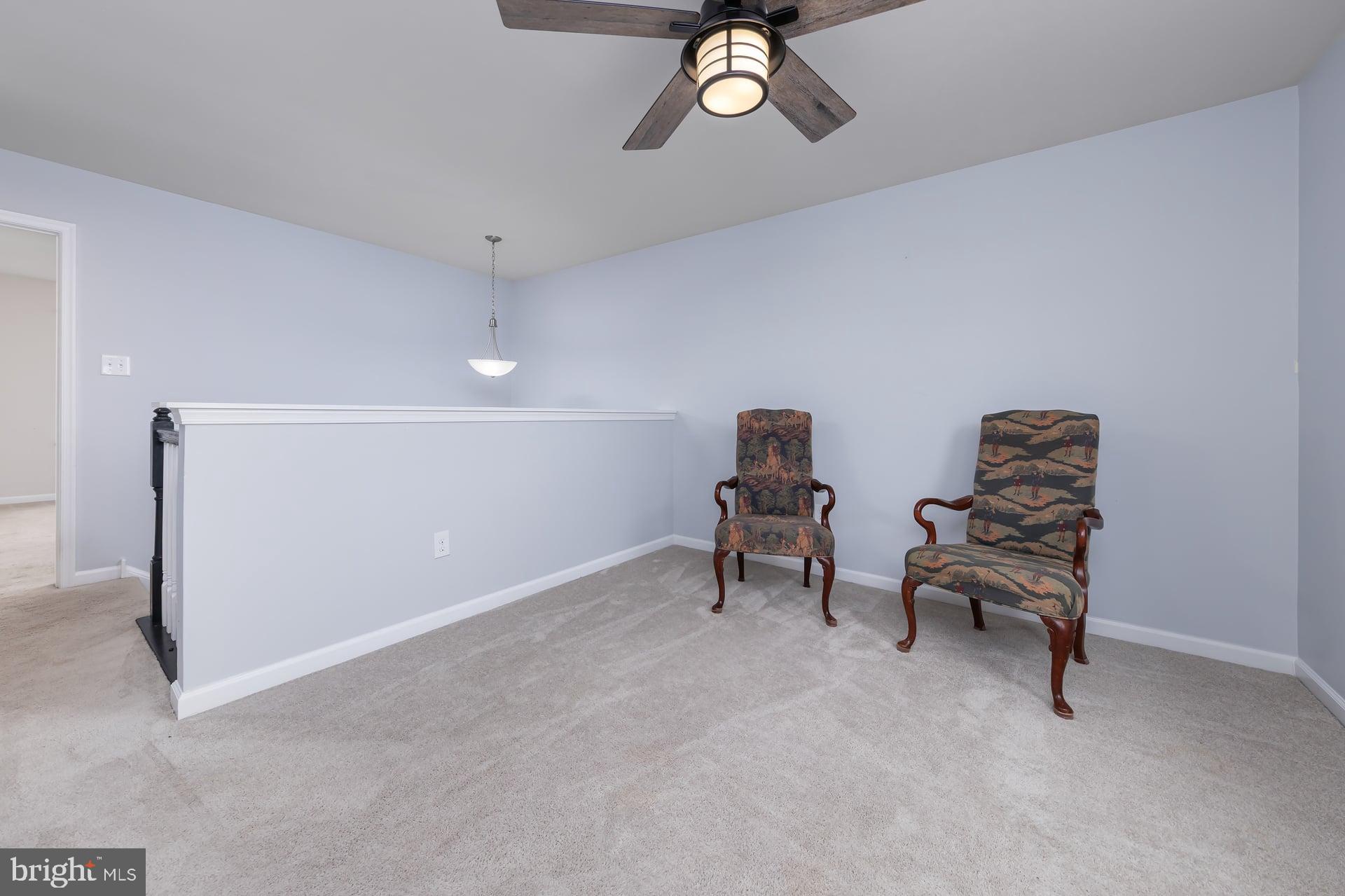 53 Oak Ln. Carneys Point, NJ 08069 - Photo 19 of 28 a bedroom with furniture and a chandelier fan
