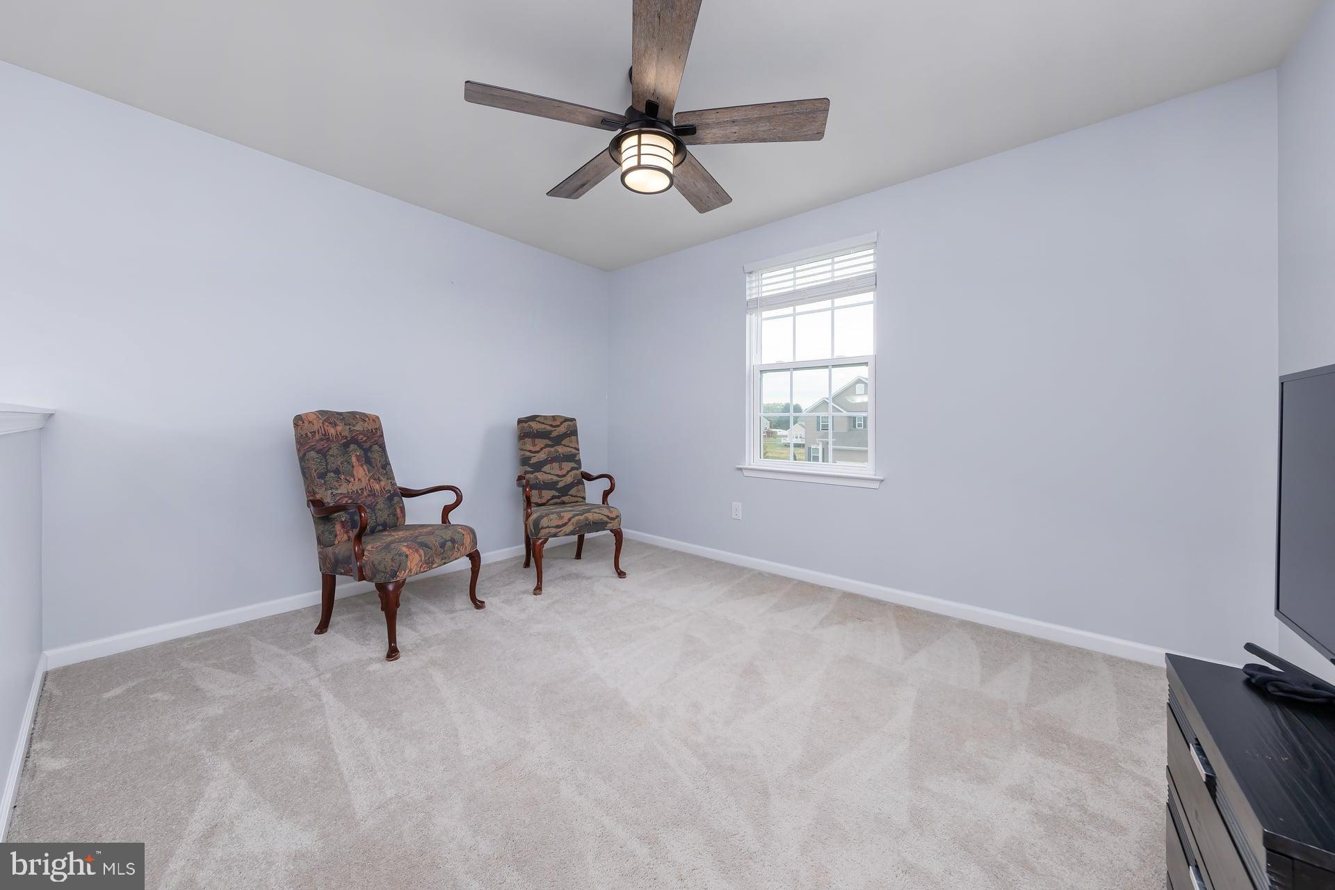53 Oak Ln. Carneys Point, NJ 08069 - Photo 20 of 28 a living room with furniture and a window