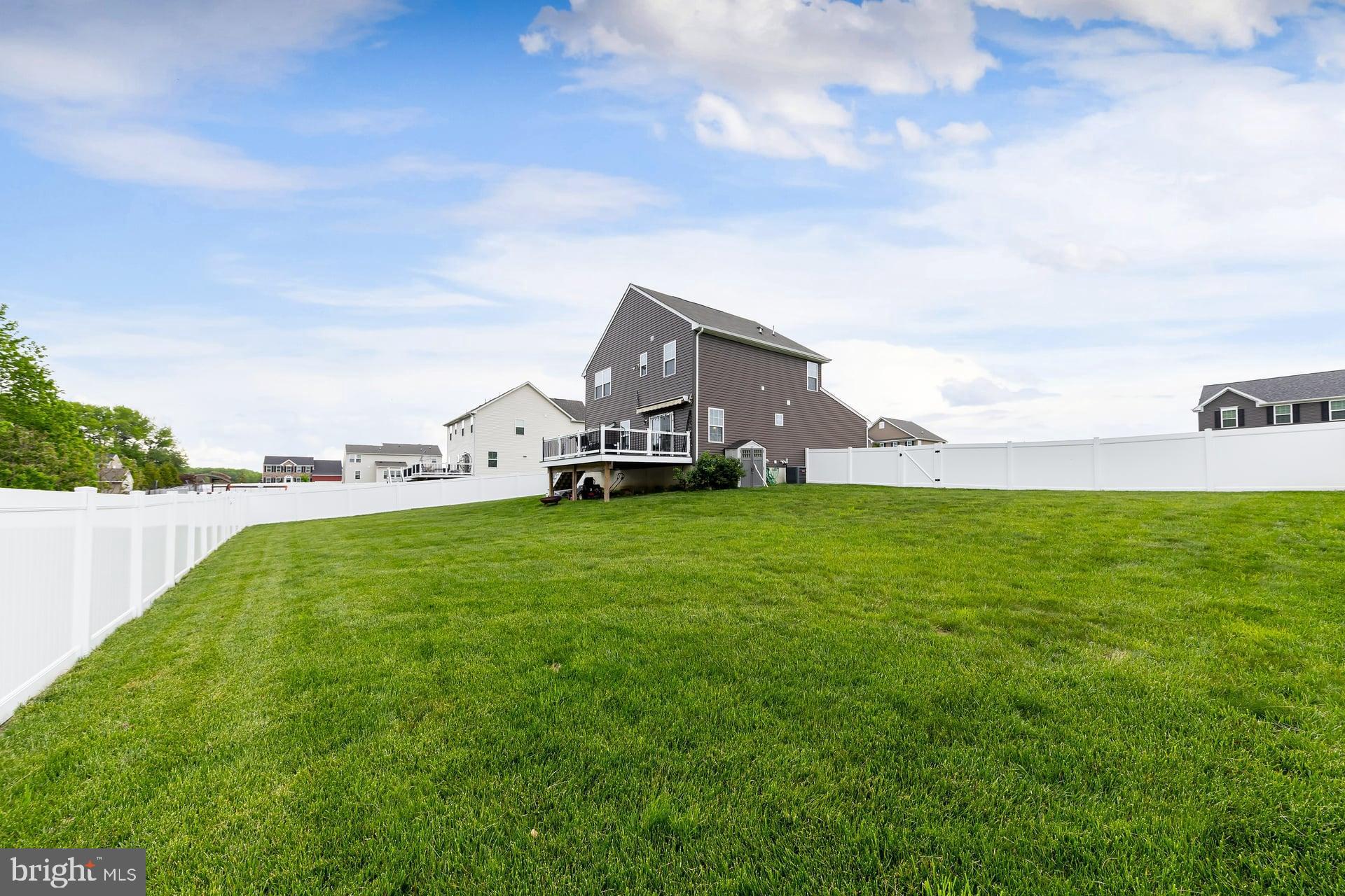 53 Oak Ln. Carneys Point, NJ 08069 - Photo 27 of 28 a view of a house with a big yard