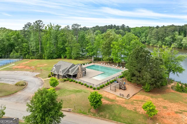 an aerial view of a house with mountain view