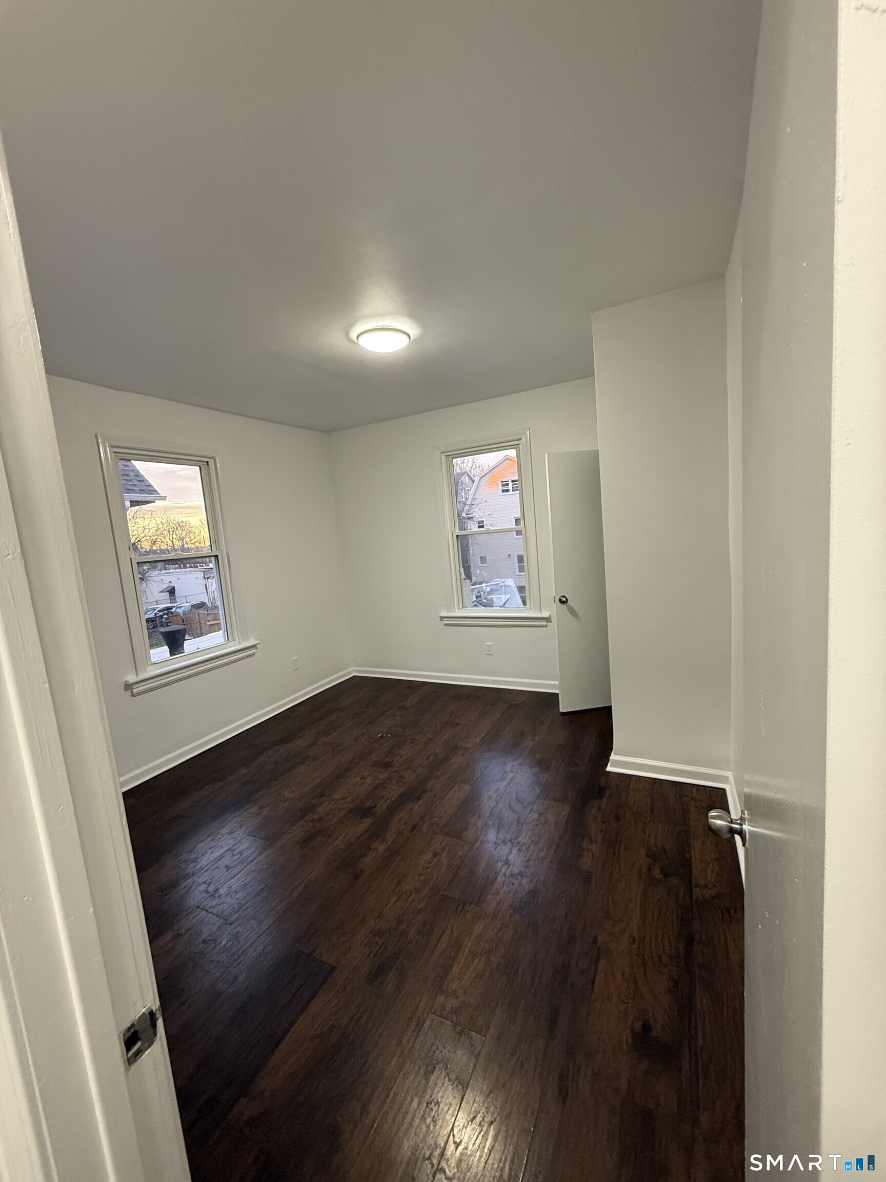 127 Eagle Street Bridgeport, CT 06607 - Photo 13 of 14 The second bedroom is also pristine and generously sized.