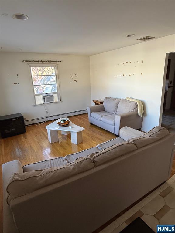 581 Broad Street, Unit 2 Carlstadt, NJ 07072 - Photo 3 of 15 a living room with furniture and a window