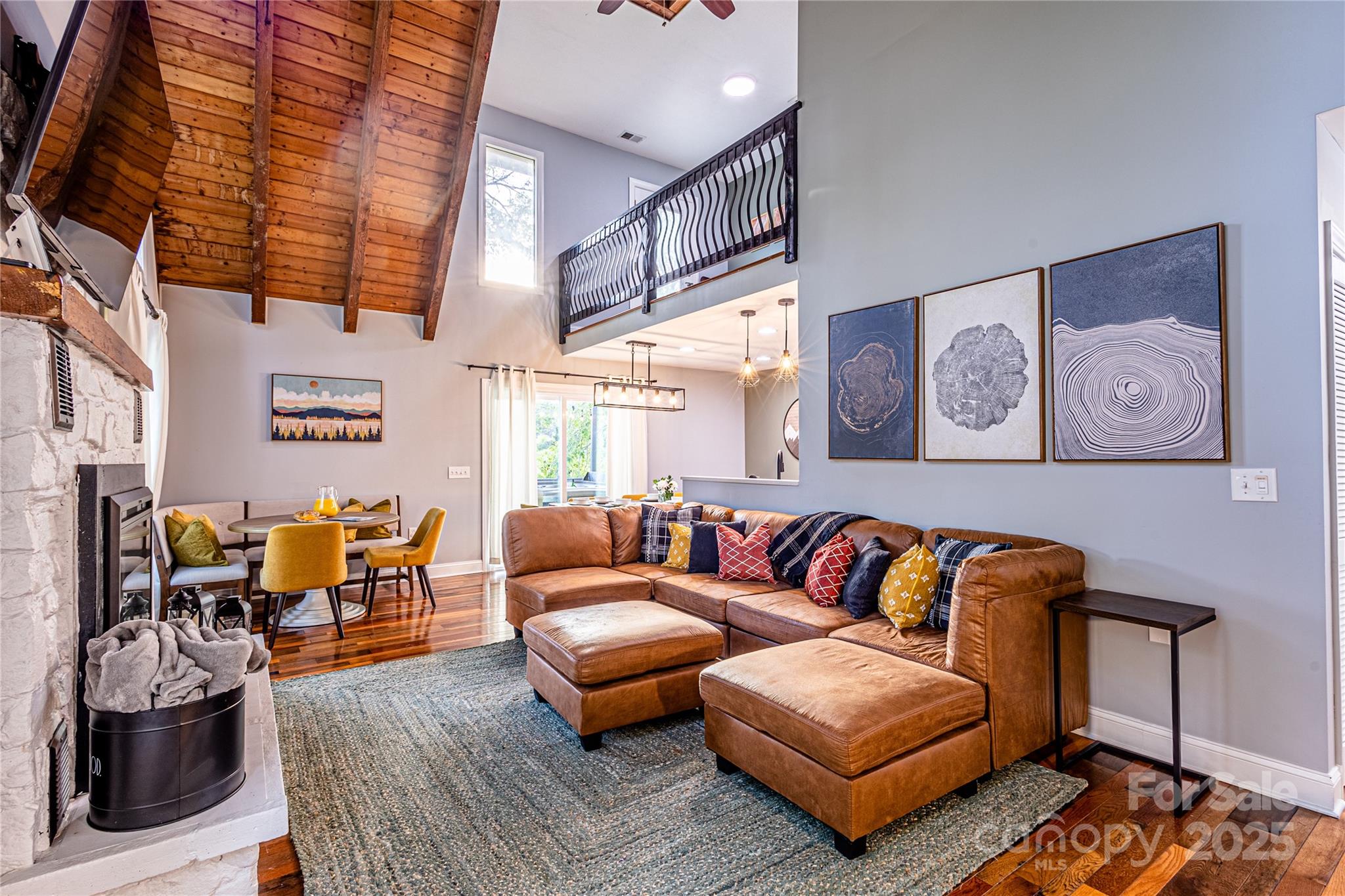 540 Toot Hollow Road Bryson City, NC 28713 - Photo 12 of 47 a living room with furniture and wooden floor