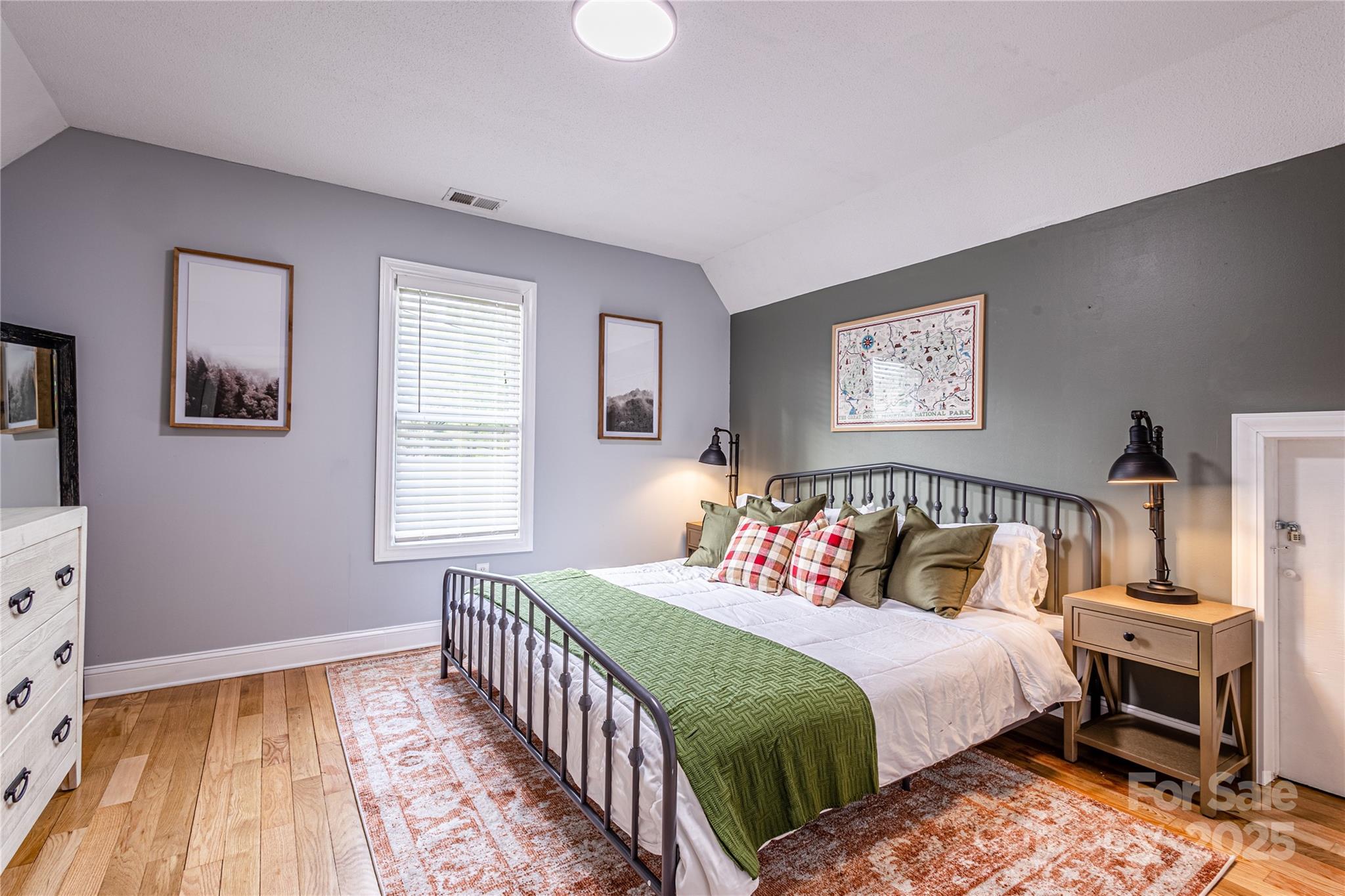 540 Toot Hollow Road Bryson City, NC 28713 - Photo 27 of 47 a bedroom with bed and a window
