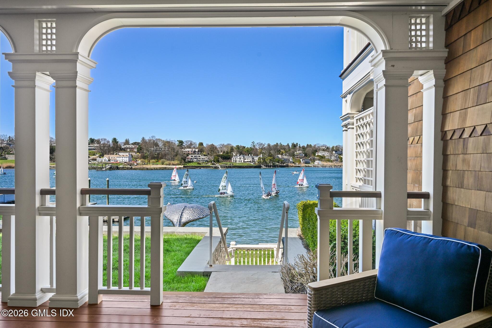 702 Steamboat Road, Unit 6 Greenwich, CT 06830 - Photo 3 of 45 a view of a balcony with wooden floor and city view