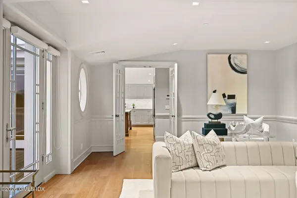 a bedroom with a bed and a couch