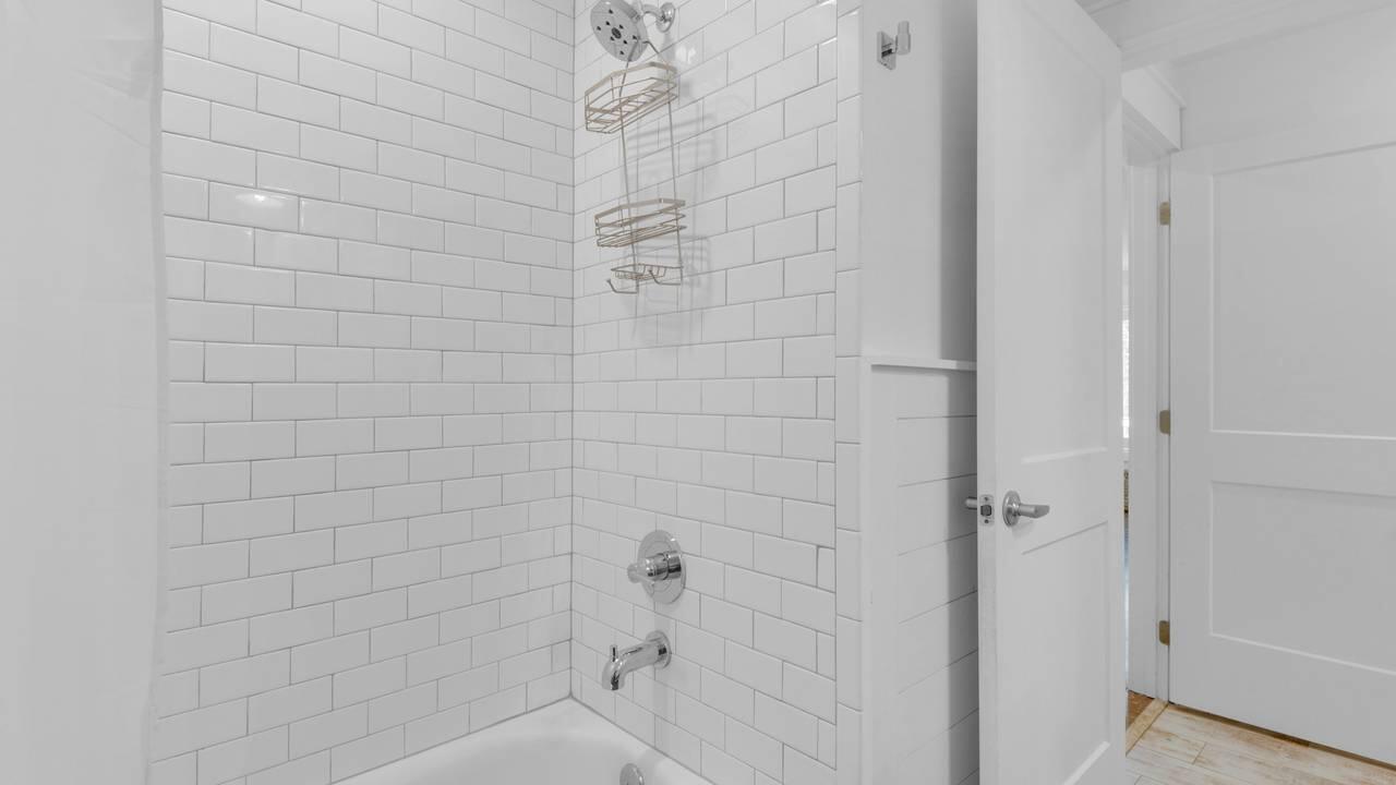 5054 Beachwalk Way Miramar Beach, FL 32550 - Photo 22 of 28 a bathroom with a shower