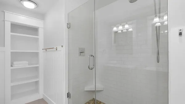 a bathroom with a mirror