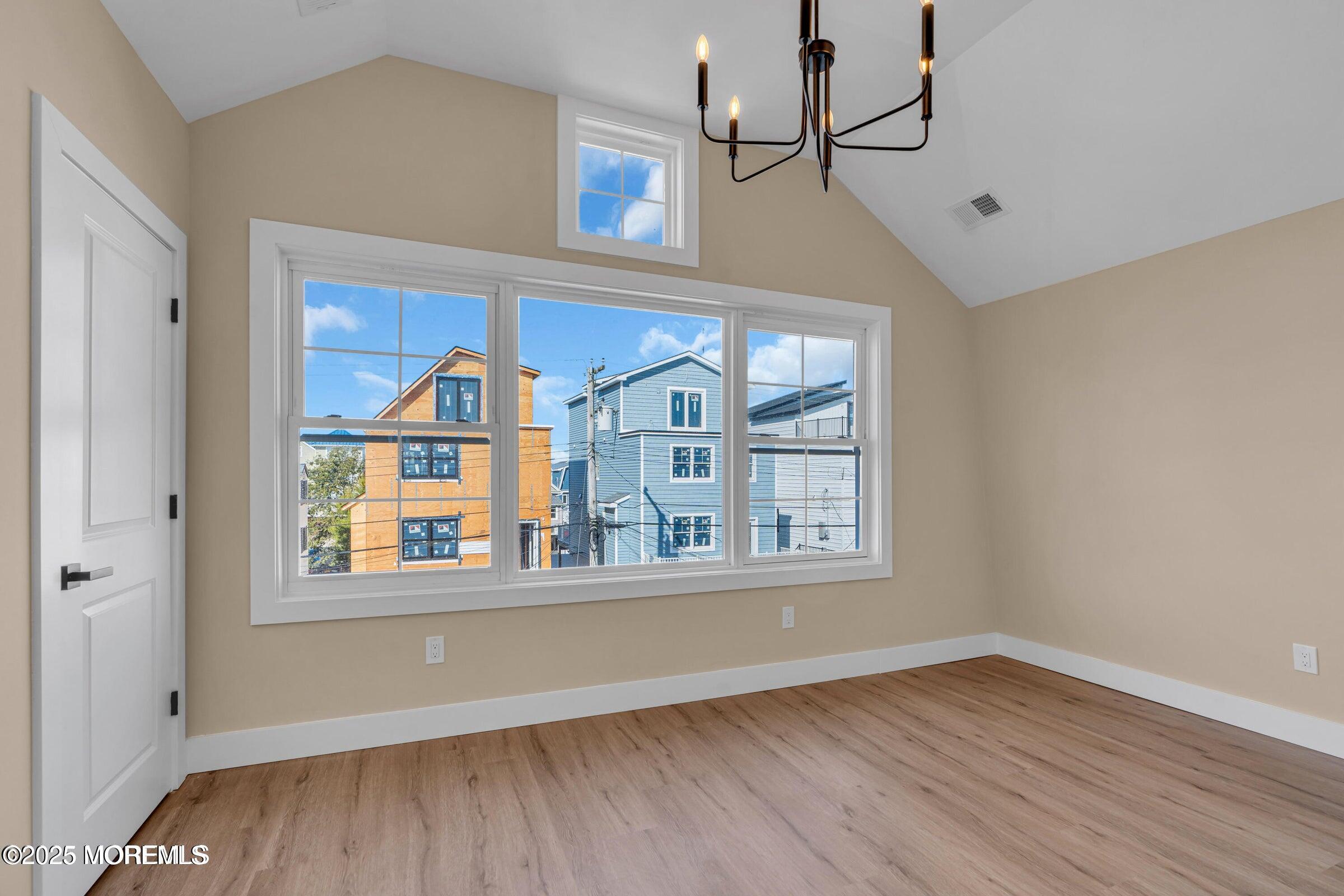 39 Sea Drift Avenue Highlands, NJ 07732 - Photo 9 of 12 a view of an entryway with wooden floor