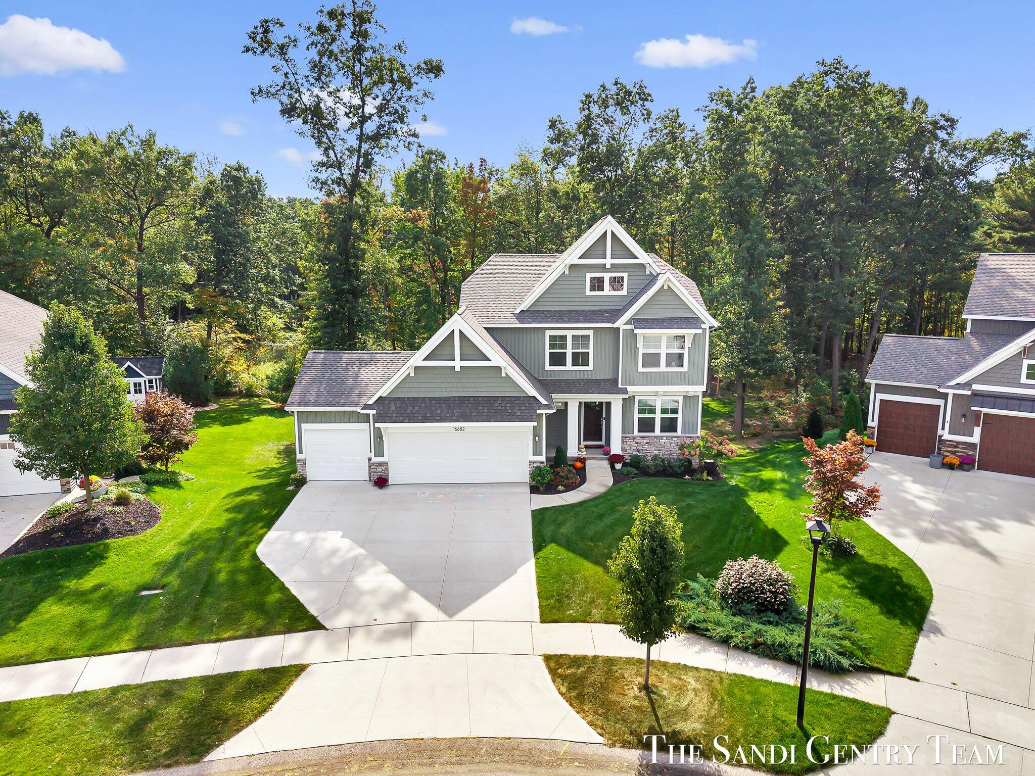 16682 Spring Tree Drive Spring Lake, MI 49456 - Photo 2 of 85 04-DJI_20251006141431_0016_D_KYLE