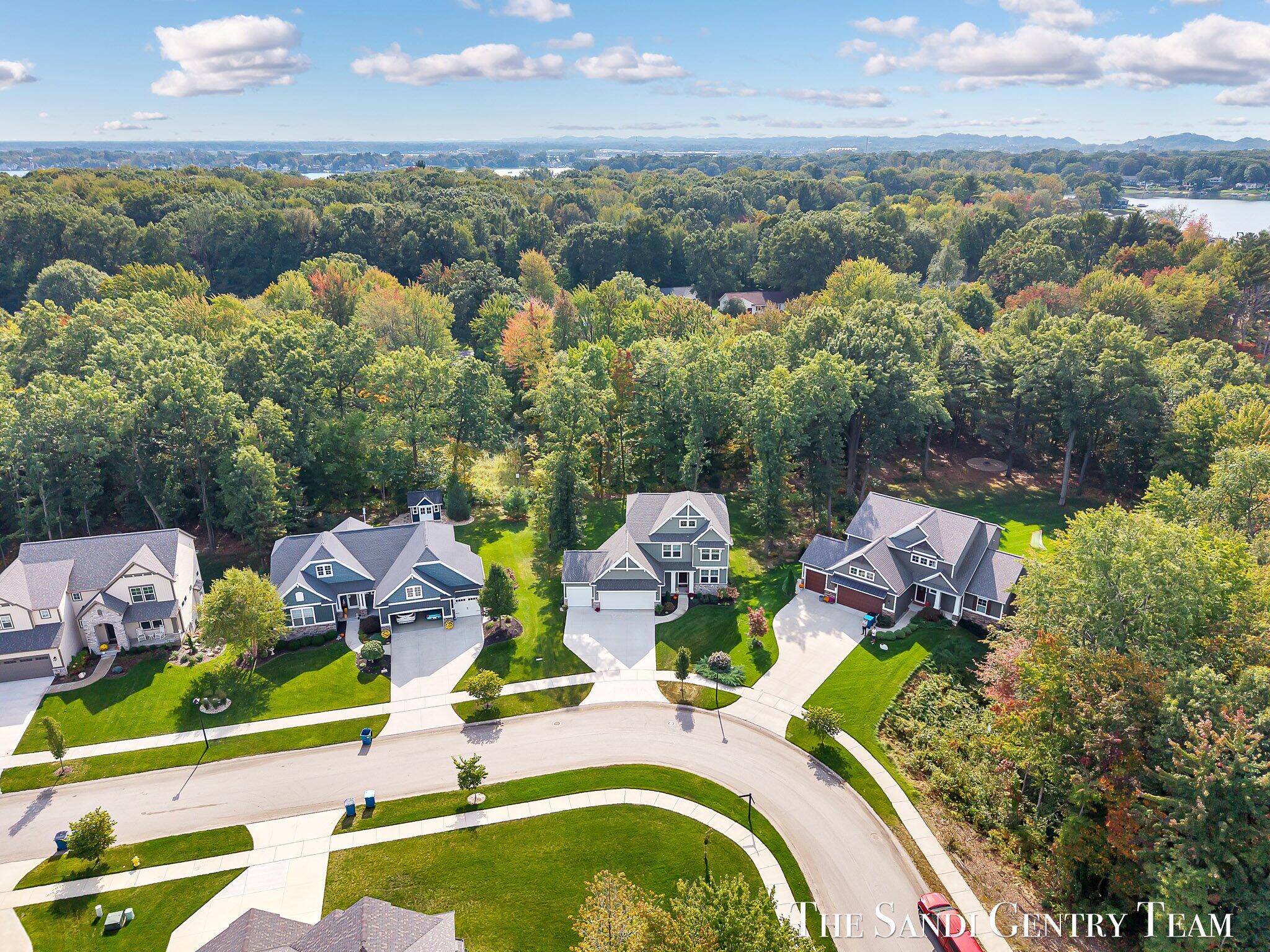 16682 Spring Tree Drive Spring Lake, MI 49456 - Photo 5 of 85 56-DJI_20251006141536_0031_D_KYLE