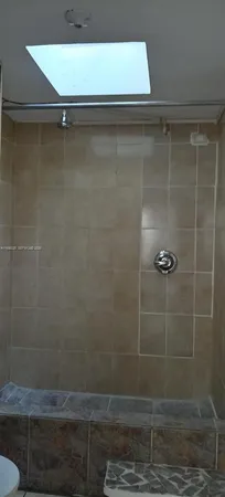 a close view of a shower in a bathroom