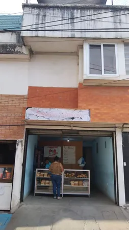 a car parked in front of a building