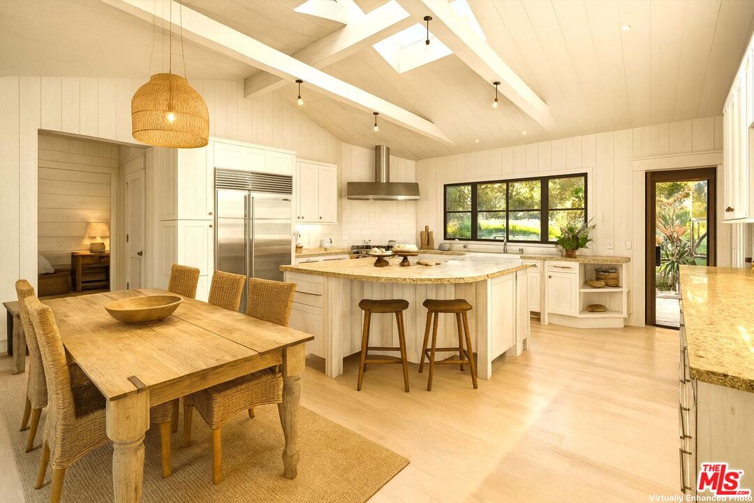 796 Hot Springs Road Montecito, CA 93108 - Photo 15 of 47 a large kitchen with a table and chairs