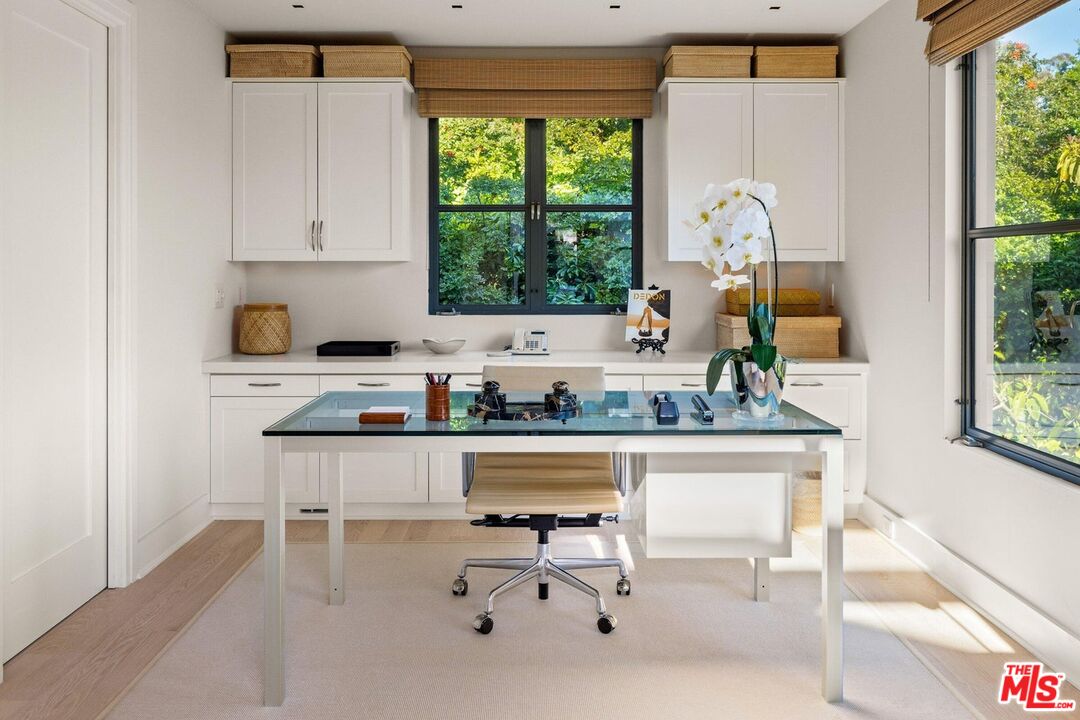 796 Hot Springs Road Montecito, CA 93108 - Photo 30 of 47 a living room with kitchen island furniture and a window