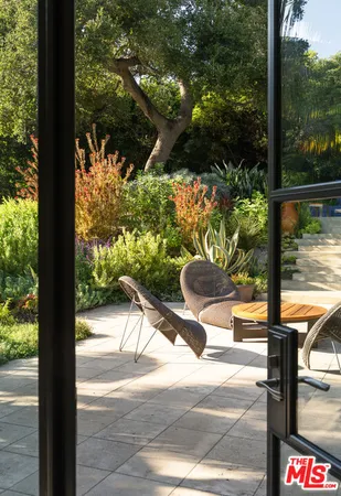 a view of a bench in a backyard