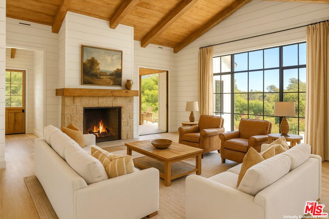 796 Hot Springs Road Montecito, CA 93108 - Photo 10 of 47 a living room with furniture and a fireplace
