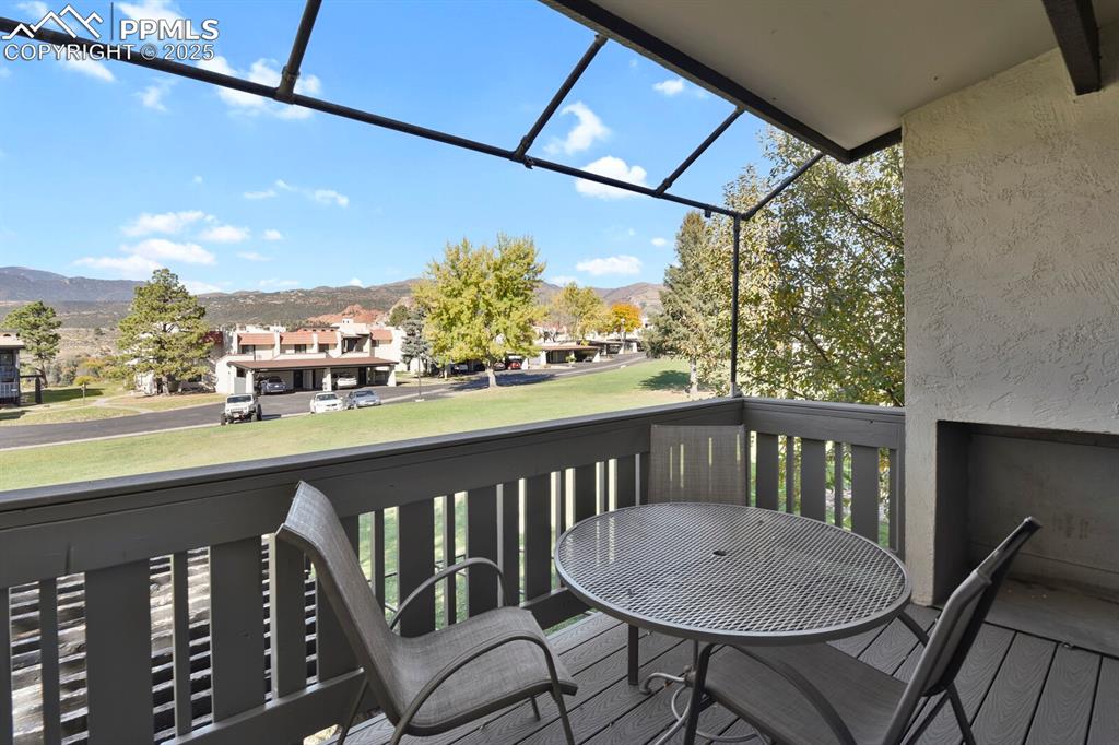 1006 Fontmore Road, Unit C Colorado Springs, CO 80904 - Photo 21 of 33 a view of a chairs and table in the balcony