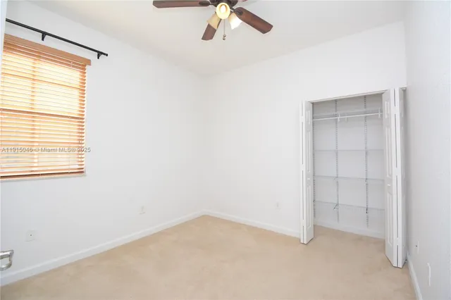 a utility room with a window dryer and washer