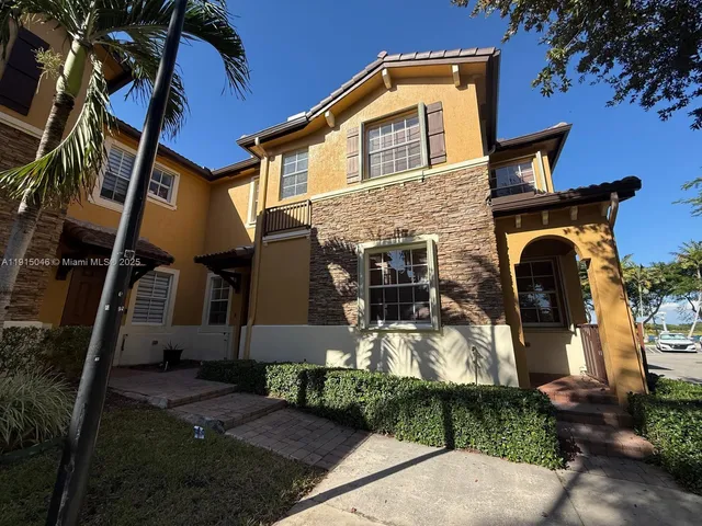 a view of a backyard of the house