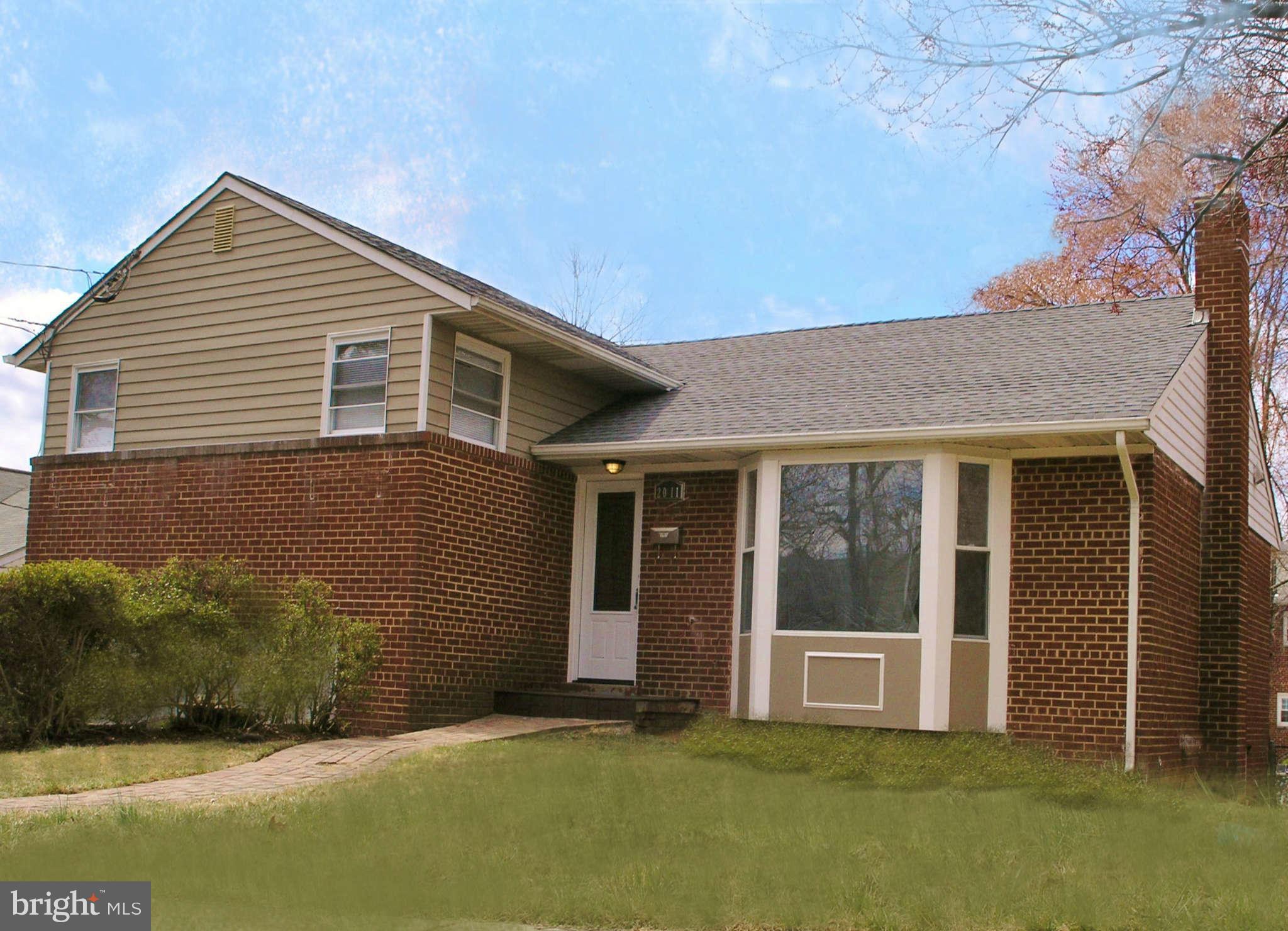 2011 Cascade Road Silver Spring, MD 20902 - Photo 2 of 24 a view of a house with a yard
