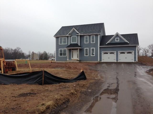 10-four Four Bridges Road Somers, CT 06071 - Photo 1 of 1 a view of a house with a wooden deck