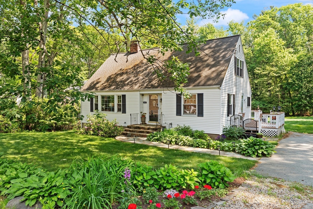 187 Cedar Street Lexington, MA 02421 - Photo 1 of 1 a view of a house with yard and a garden