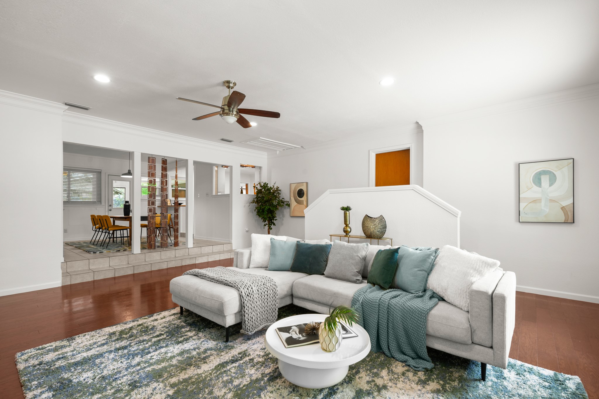 4702 Lasso Path Austin, TX 78745 - Photo 20 of 31 Living area with wood finished floors, ceiling fan, ornamental molding, and recessed lighting