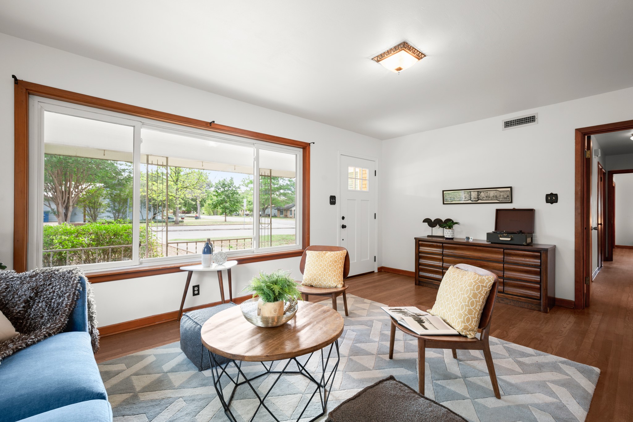 4702 Lasso Path Austin, TX 78745 - Photo 2 of 31 Living room with wood finished floors and baseboards