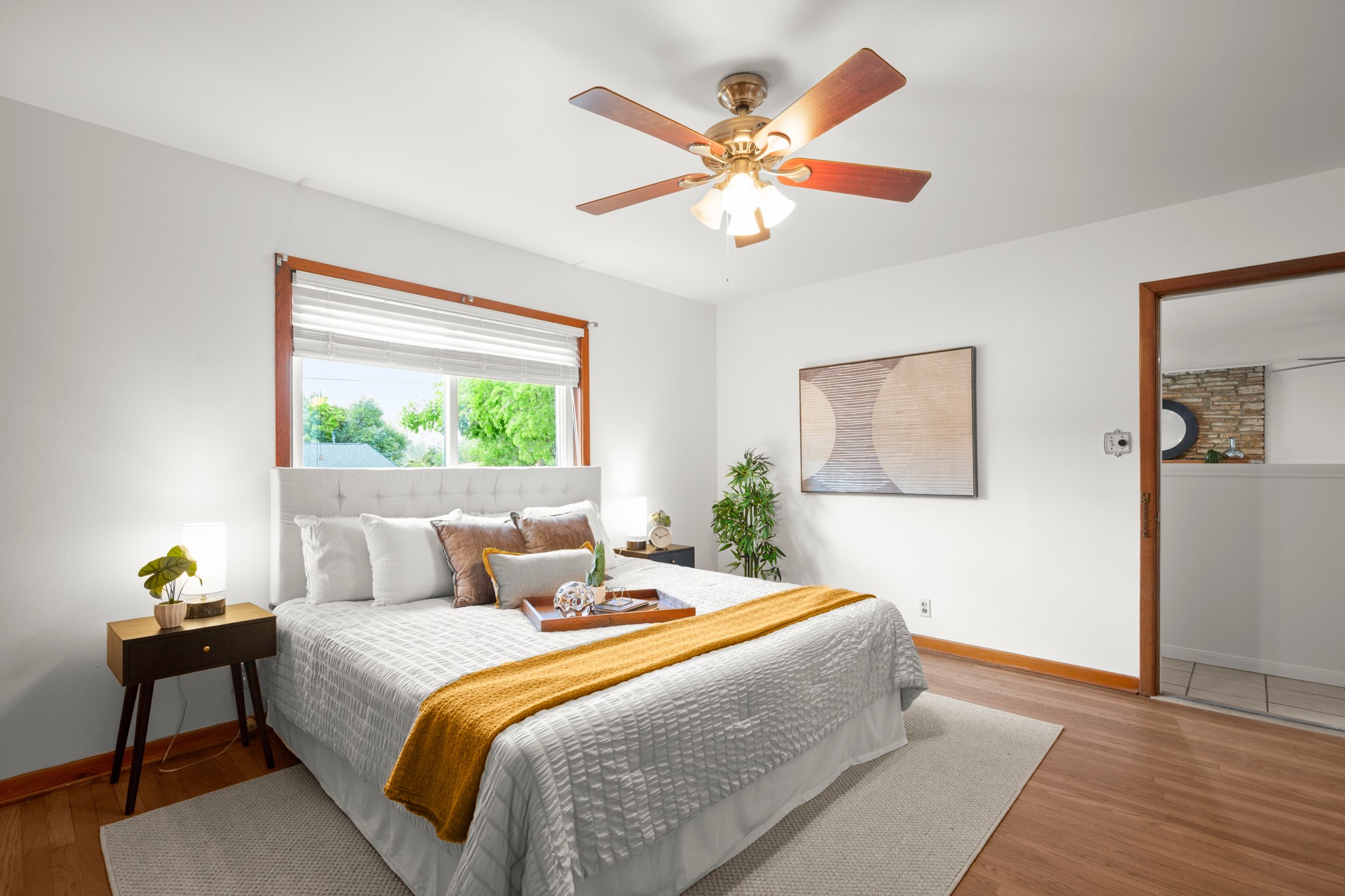 4702 Lasso Path Austin, TX 78745 - Photo 21 of 31 Bedroom featuring wood finished floors and ceiling fan