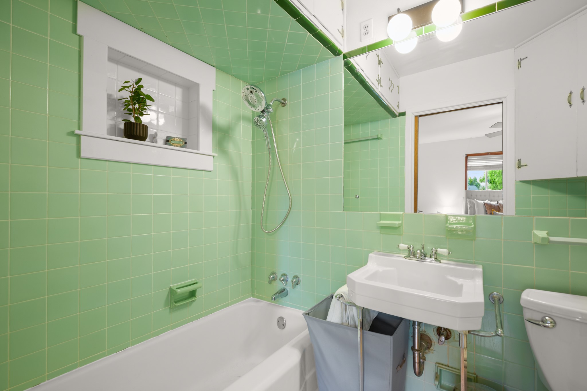 4702 Lasso Path Austin, TX 78745 - Photo 23 of 31 Full bathroom with tub / shower combination and tile walls