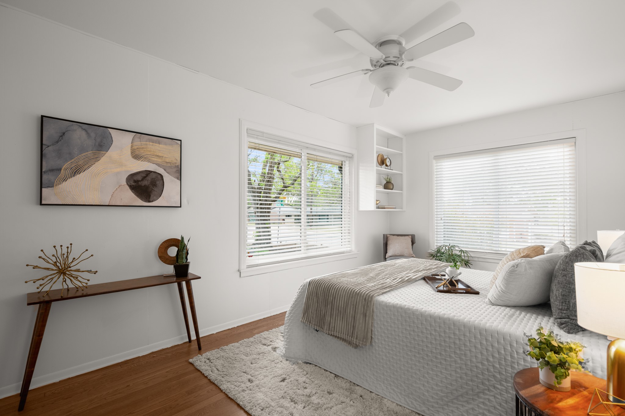 4702 Lasso Path Austin, TX 78745 - Photo 24 of 31 Bedroom featuring wood finished floors and a ceiling fan