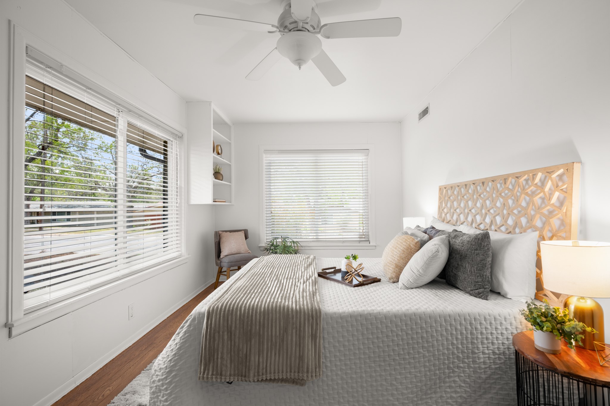 4702 Lasso Path Austin, TX 78745 - Photo 25 of 31 Bedroom with dark wood-type flooring, ceiling fan, and multiple windows