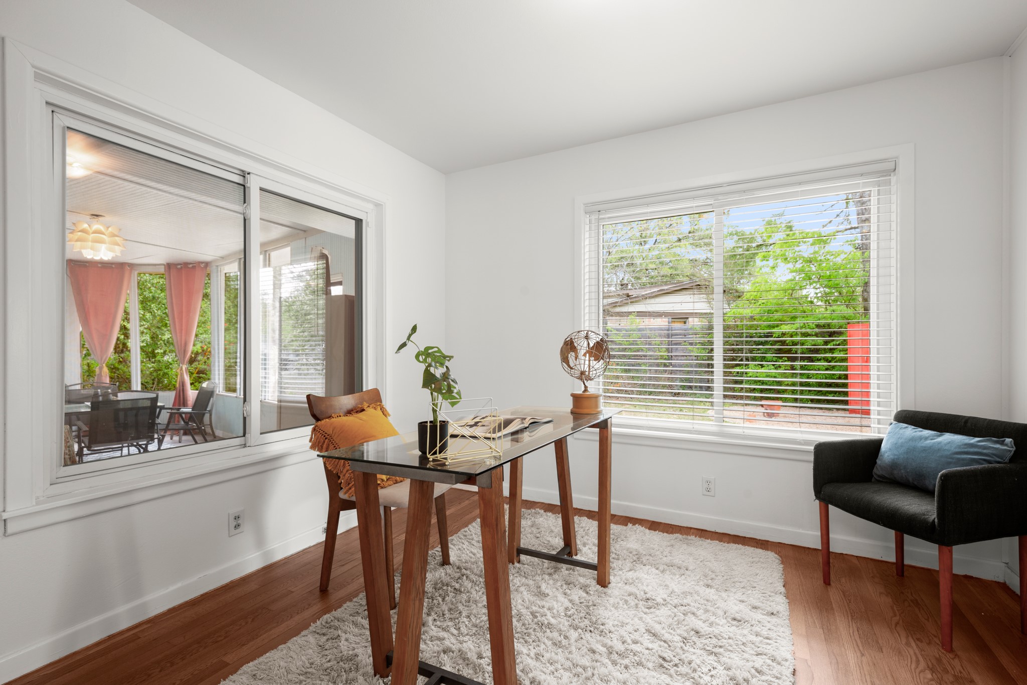 4702 Lasso Path Austin, TX 78745 - Photo 4 of 31 Home office featuring wood finished floors and baseboards