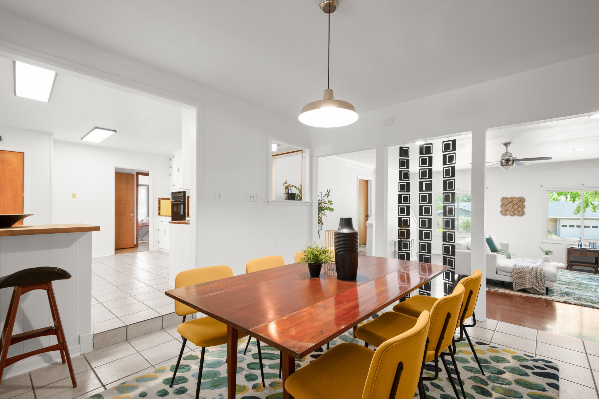 4702 Lasso Path Austin, TX 78745 - Photo 8 of 31 Dining room featuring light tile patterned floors and ceiling fan
