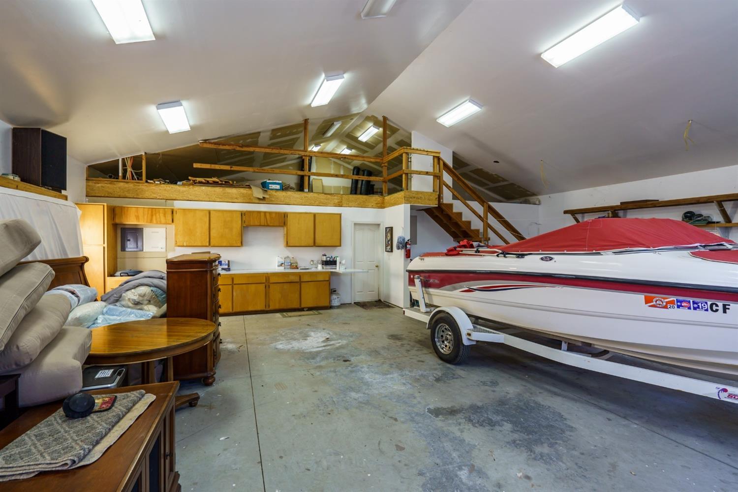 4536 Usona Road Mariposa, CA 95338 - Photo 47 of 54 Large fully finished garage/shop. For some reason looks smaller in this picture, but has held 4 boats.
