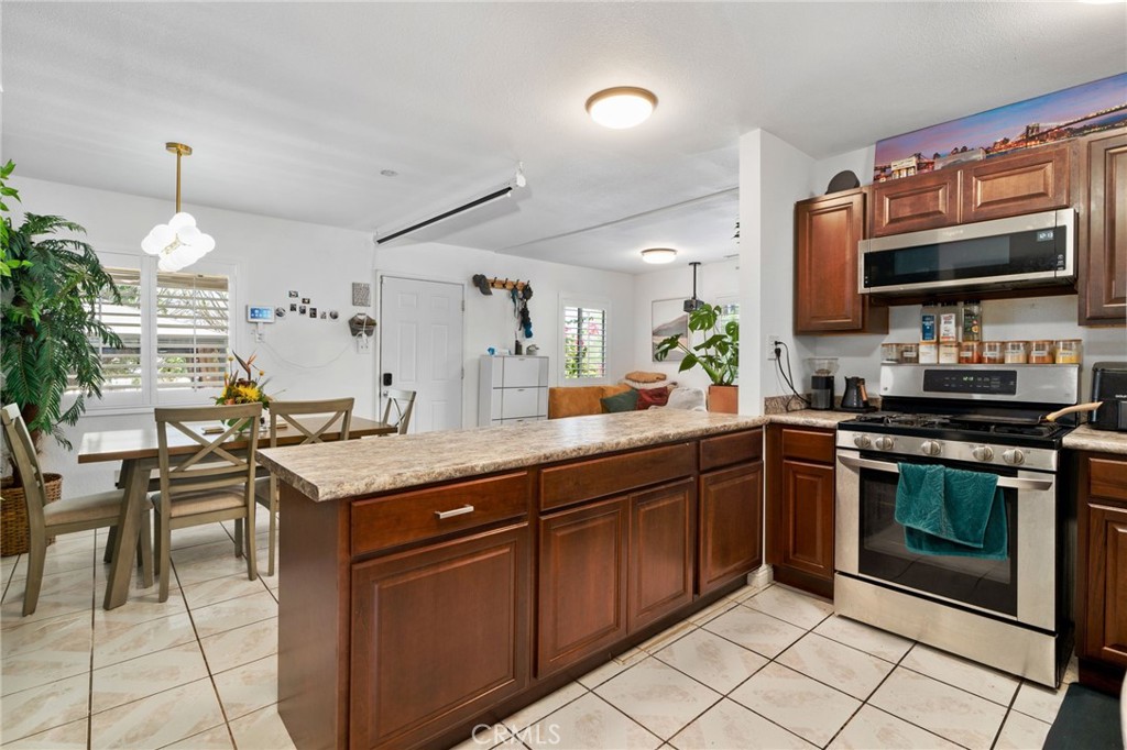 957 East George Street Banning, CA 92220 - Photo 18 of 44 Shows old tile flooring.