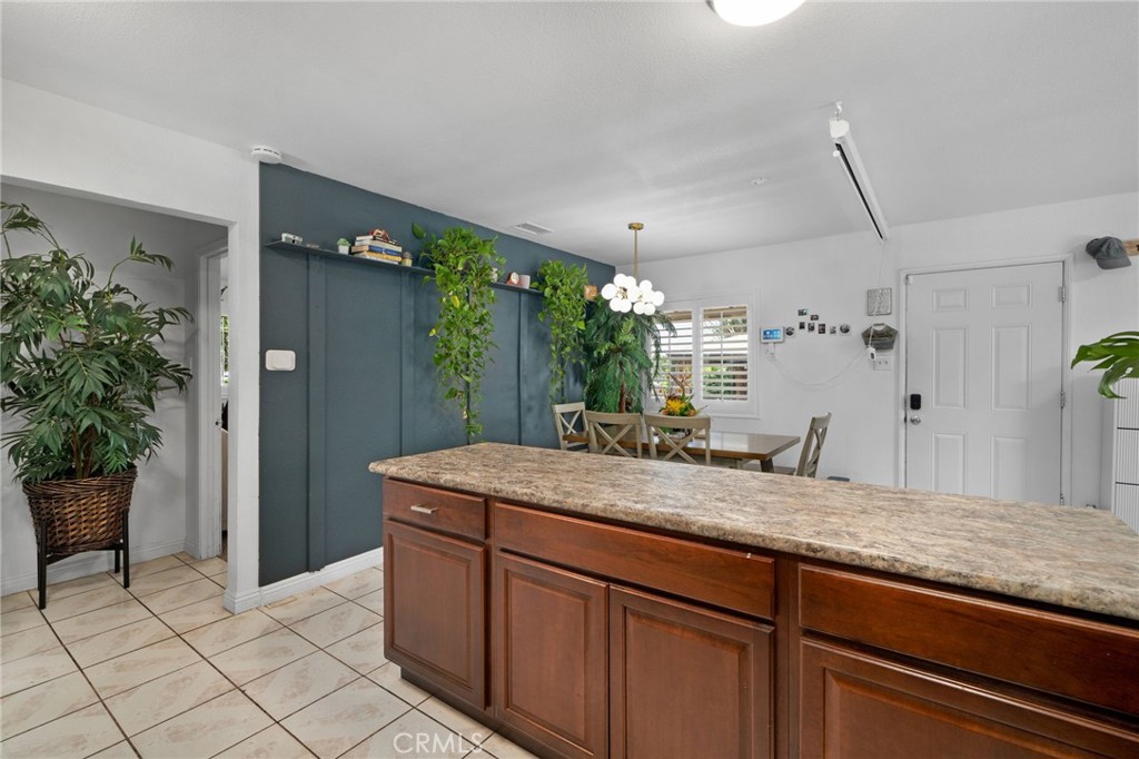 957 East George Street Banning, CA 92220 - Photo 20 of 44 Shows old tile flooring.