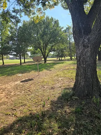 a view of a yard with an outdoor space