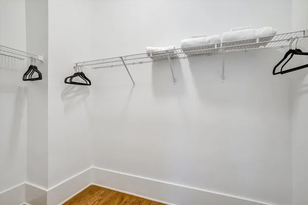 a view of a room with racks on the wall