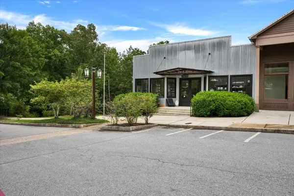 front view of a house with a garden
