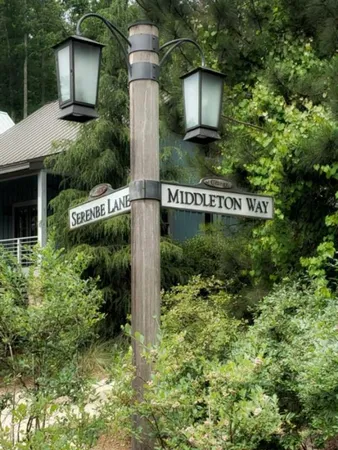 a sign that is on the side of a house